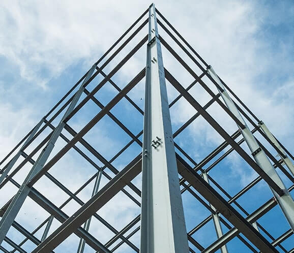 a high steele structure with the sky as a background